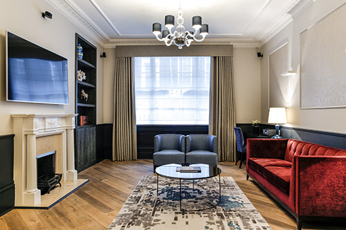The sitting area of a suite at Flemings Mayfair Hotel