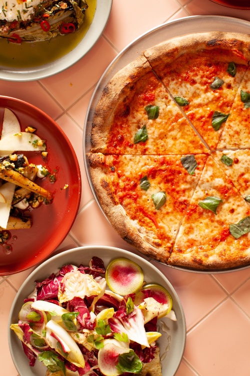 Pizza and salads at Mel's
