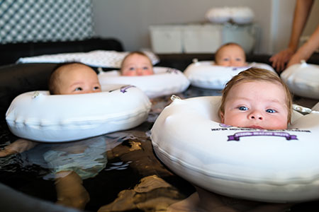 Babies floating in the tub
