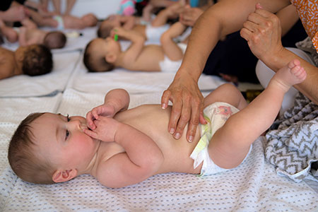Babies getting a massage